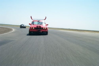 Illustration for article titled $20 Bumper-Mounted Still Camera Works Great On The Race Track... Until It Gets Smashed